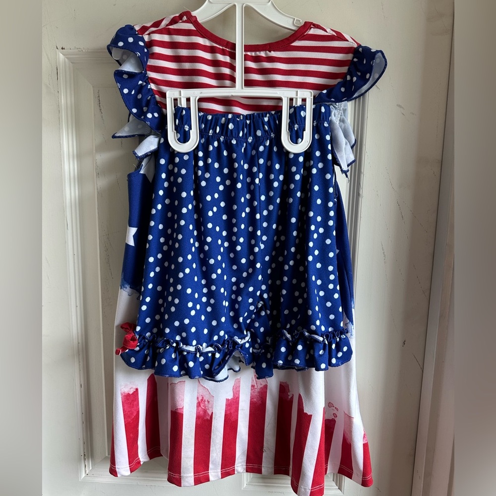 Adorable girls matching July 4th set.  Size 10.  Ruffled shorts w/red bow.